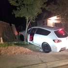 Suspected Gang Member Leads Deputies on Chase, Throws Stolen Gun out of Car & Crashes into Backyard Fence