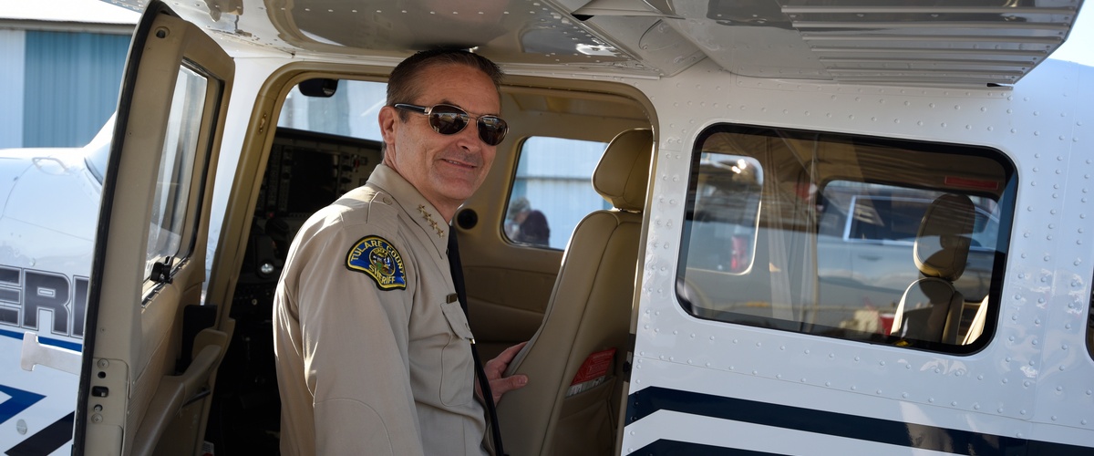 Sheriff Boudreaux with one of two new Cessna aircraft for the Sheriff's Office.
